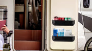 Supplier application illustration of a black storage tray on the inner face of an RV door.