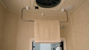 Ceiling-Mounted Folding Clothes Drying Rack for RV & Camper Laundry Storage — company-source example of use; other pictured objects are not included