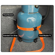 Supplier photograph showing the orange 1.5 m strap, wall bracket and three base feet beside a supported cylinder.
