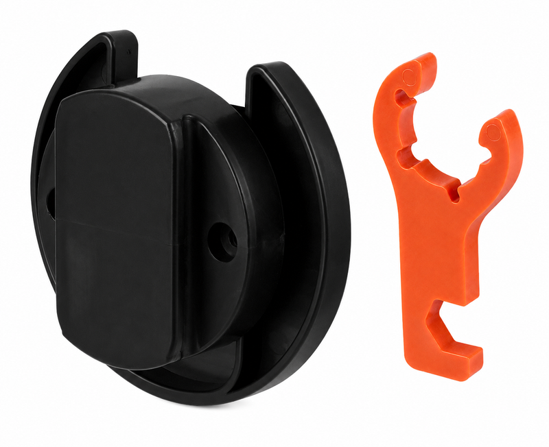 Black wall-mount gas-cap storage holder shown beside its orange C-shaped clip